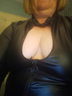 Cleavage on show in wetllook dress