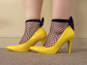 Kinky Shoes will fishnet stockings.