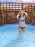 Amy Splashing About In The Sun Wearing Bikini
