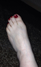 Beautiful red painted toenails
