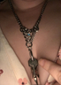 Chastity keys in Mistresses cleavage 