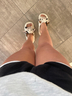 TANNED LEGS AND CUTE SLIPPERS