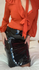 WFH in PVC skirt and orange blouse